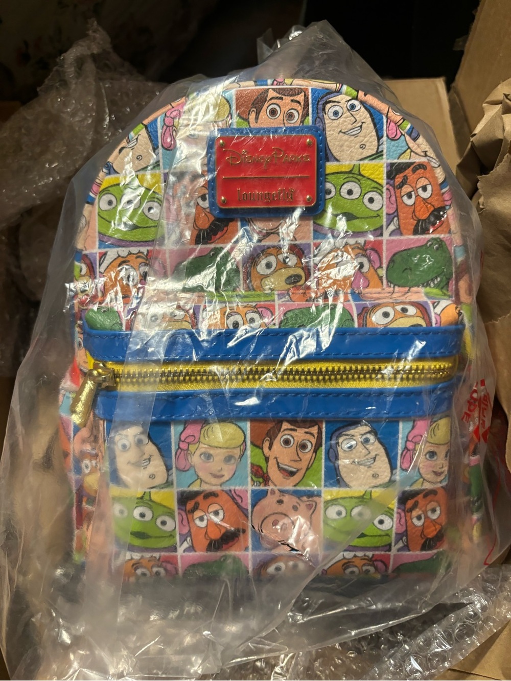 Loungefly Multicolor Toy Story Patchwork Mini Backpack with Blue Trim
